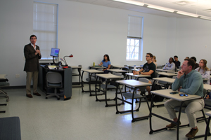 Dr. Jacobson teaching a group of students