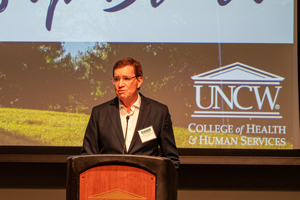 Dr. Jacobson giving a speech