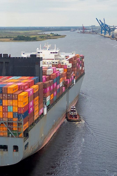 Large vessel with shipping containers in Cape Fear River