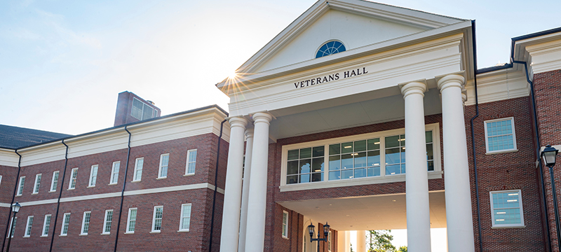 front of Veterans Hall on UNCW campus