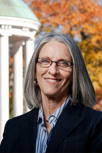 Students and community members moving bags of oyster shells