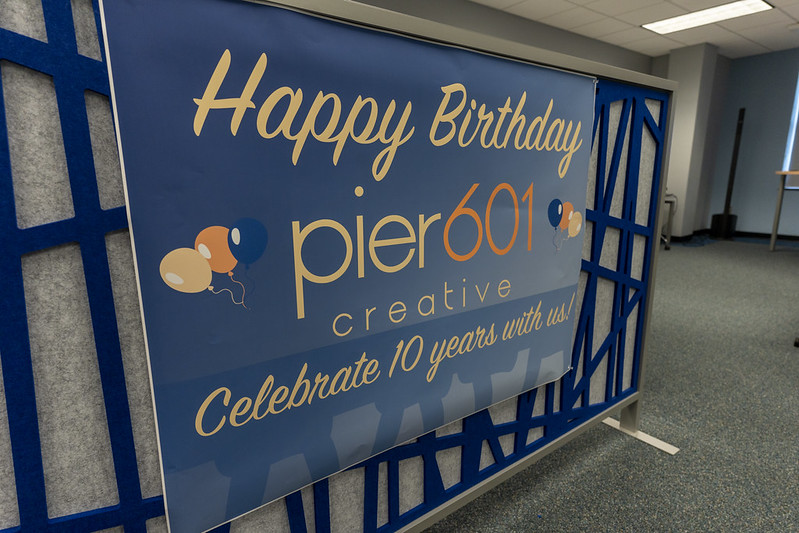 A sign celebrating the 10th anniversary of pier601.