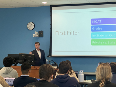 Dr. Jacobson giving lecture to students