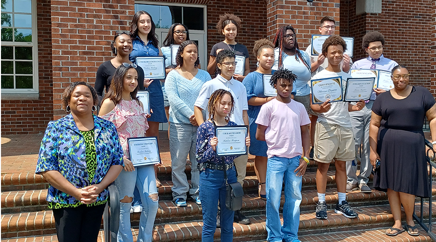 Jamiee Canty with graduating students