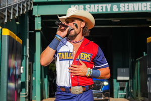 Jayson singing as he enters the field